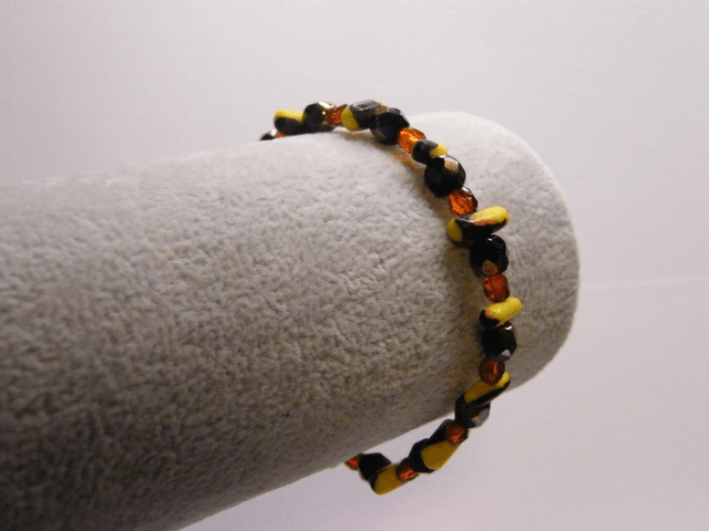 Perles Jaune/Noir/Rouge