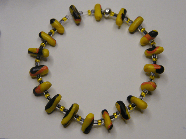 Perles Jaune/Noir/Rouge